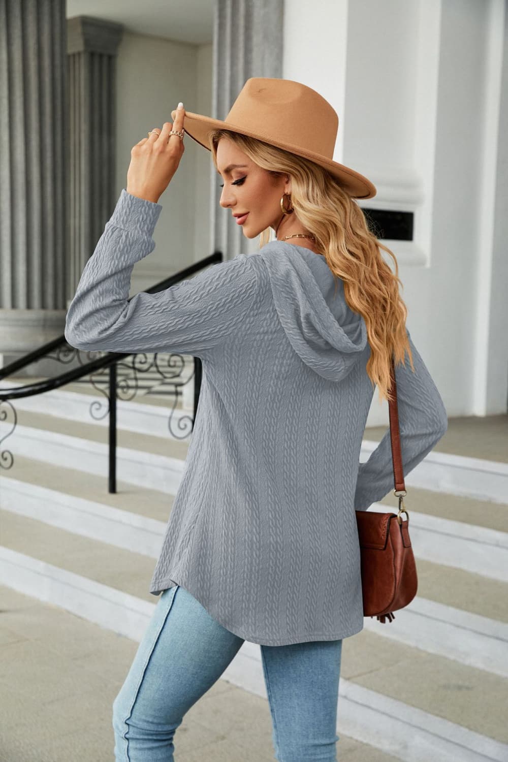 Textured hooded tunic in Cloudy Blue with long sleeves and a curved hem.