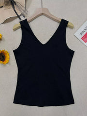 Black ribbed V-neck tank top with a fitted silhouette.