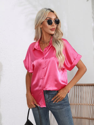 Hot Pink satin boxy sleeve blouse with button front and rolled cuffs.