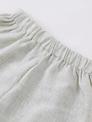 Baby shorts with elastic waistband in light grey textured fabric