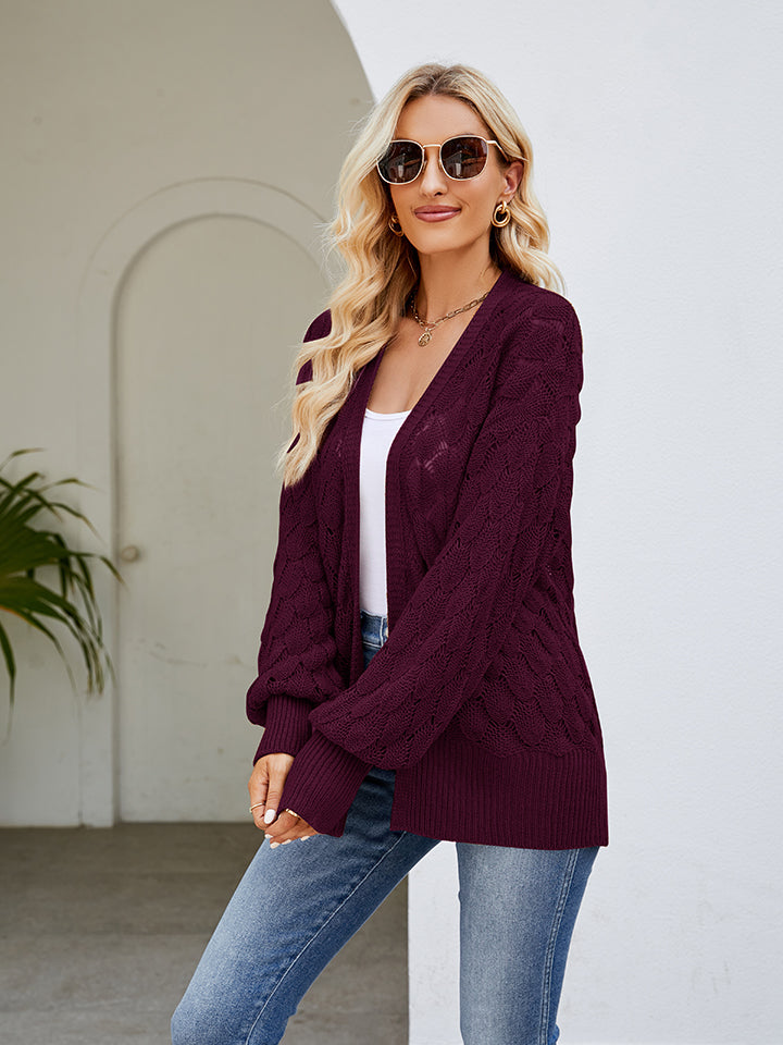 Textured open-knit wine cardigan with balloon sleeves and a relaxed fit.
