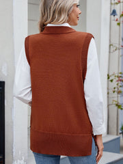 Brown ribbed knit vest with side buttons, worn over a white shirt.