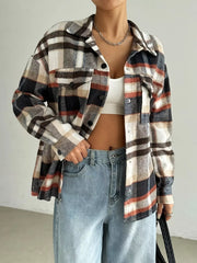 Relaxed fit plaid shirt jacket in mocha with button front and chest pockets.