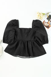 Black textured peplum blouse with square neck and petal puff sleeves