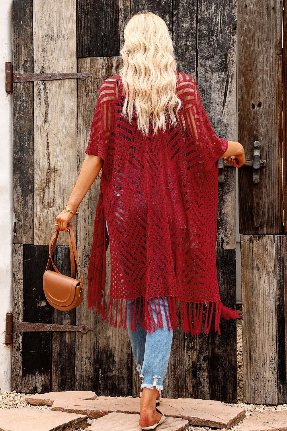 Open knit chevron fringe cardigan in rust with short sleeves and a relaxed fit.