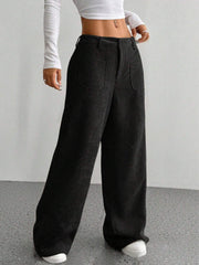 Black wide-leg corduroy utility trousers with front pockets and a relaxed fit.