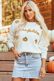 White crewneck sweater with embroidered pumpkins and "mpkin" text, acrylic knit.