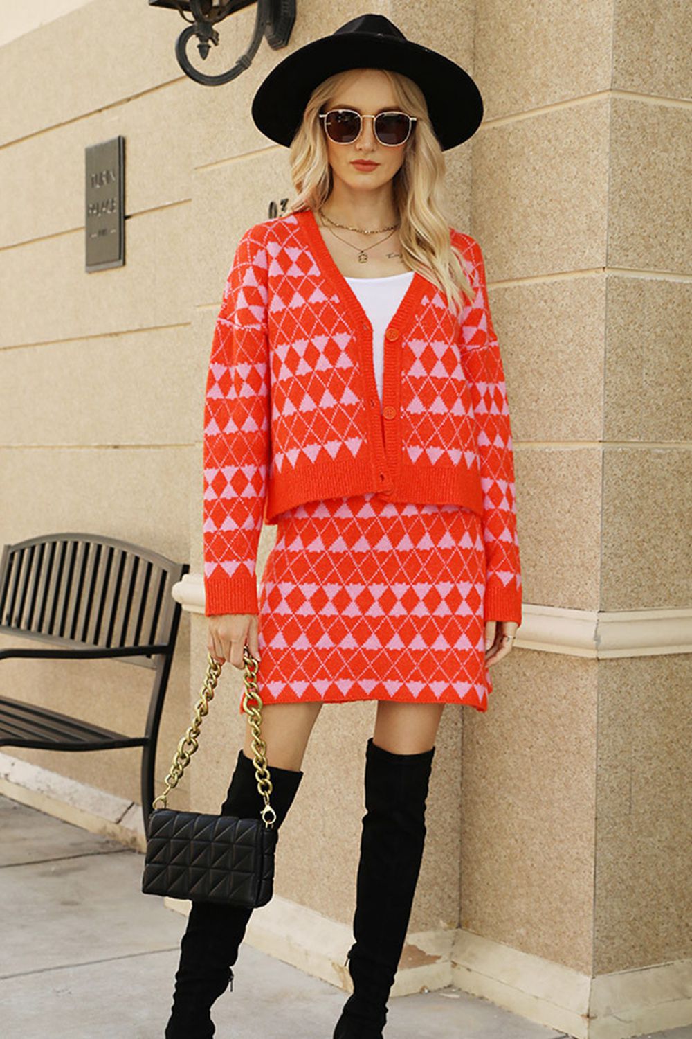 Orange argyle knit cardigan and mini skirt set with button front and v-neck