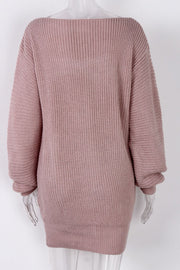 Blush pink ribbed knit mini dress with off-the-shoulder neckline and long sleeves.
