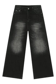 Black faded wash balloon leg jeans with a distressed effect