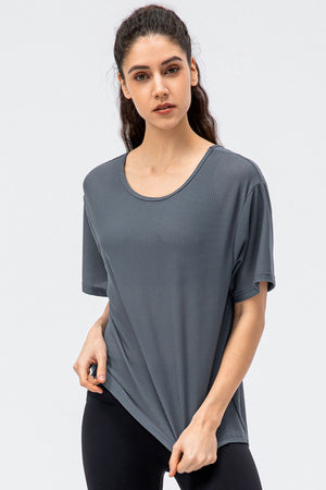 Dark gray honeycomb mesh performance tee with scoop neck and short sleeves.