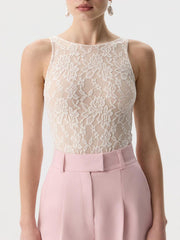 Sheer lace tank top in white with floral pattern, boat neck, sleeveless.