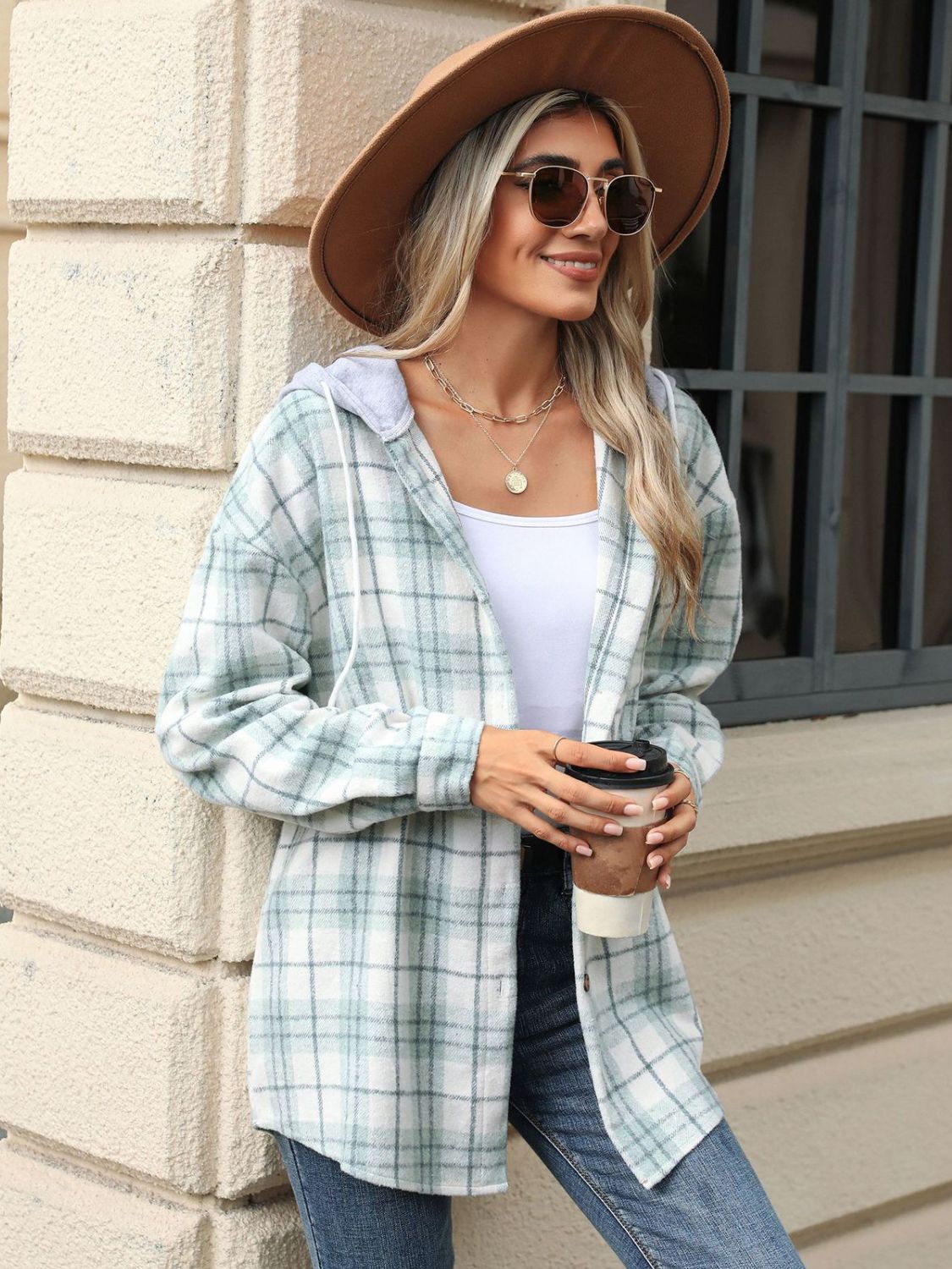 Light Green plaid shacket with hood, button front, and long sleeves.