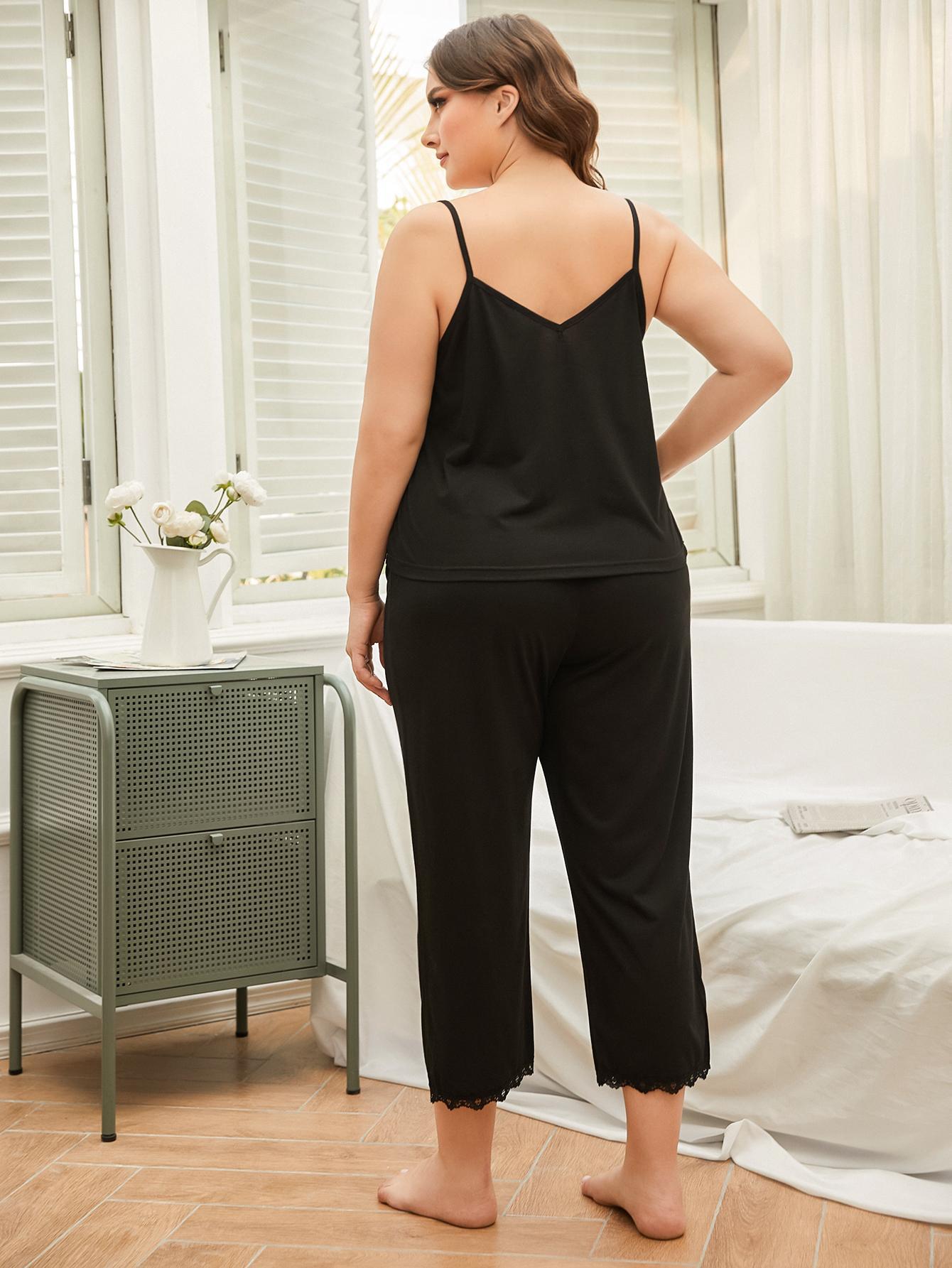 Black lace trimmed cami and capri lounge set with V-neck camisole and cropped pants.