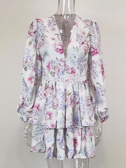 Blooming ruffle layered mini dress with a floral print and V-neck.