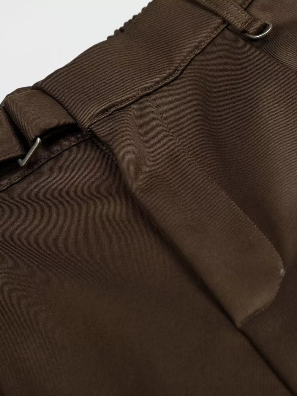 Brown pleated wide-leg maternity capris with buckle detail and elastic waistband.
