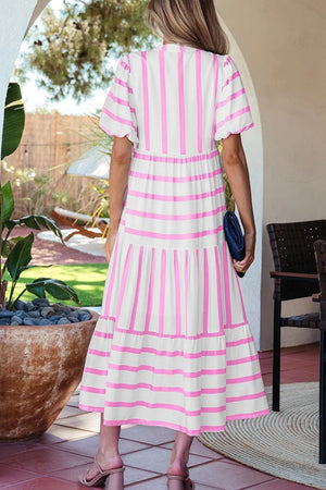 Tiered maxi dress with pink stripes, notched neck, and short sleeves.