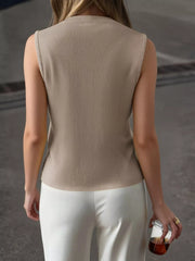 Khaki knit vest with ribbed neckline and armholes.
