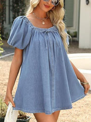 Light blue denim off-shoulder mini dress with puff sleeves and tie-front detail