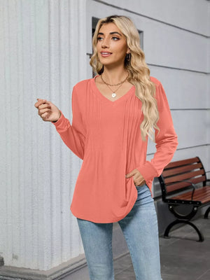 Coral V-neck long sleeve maternity t-shirt with subtle front pleats.
