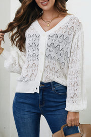 White openwork knit cardigan with balloon sleeves and button front