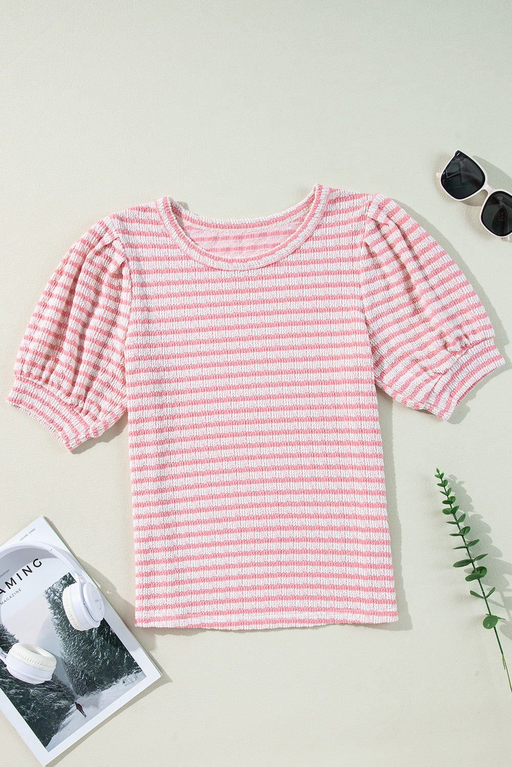 Textured stripe puff sleeve top in blush pink with a crew neck and textured fabric.