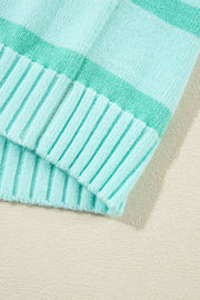 Ombre stripe knit sweater in turquoise with ribbed cuffs and neckline detail.