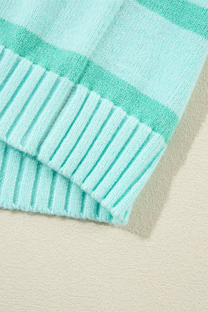 Ombre stripe knit sweater in turquoise with ribbed cuffs and neckline detail.