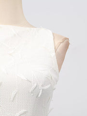White midi dress with floral applique and boat neck.