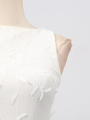 White midi dress with floral applique and boat neck.
