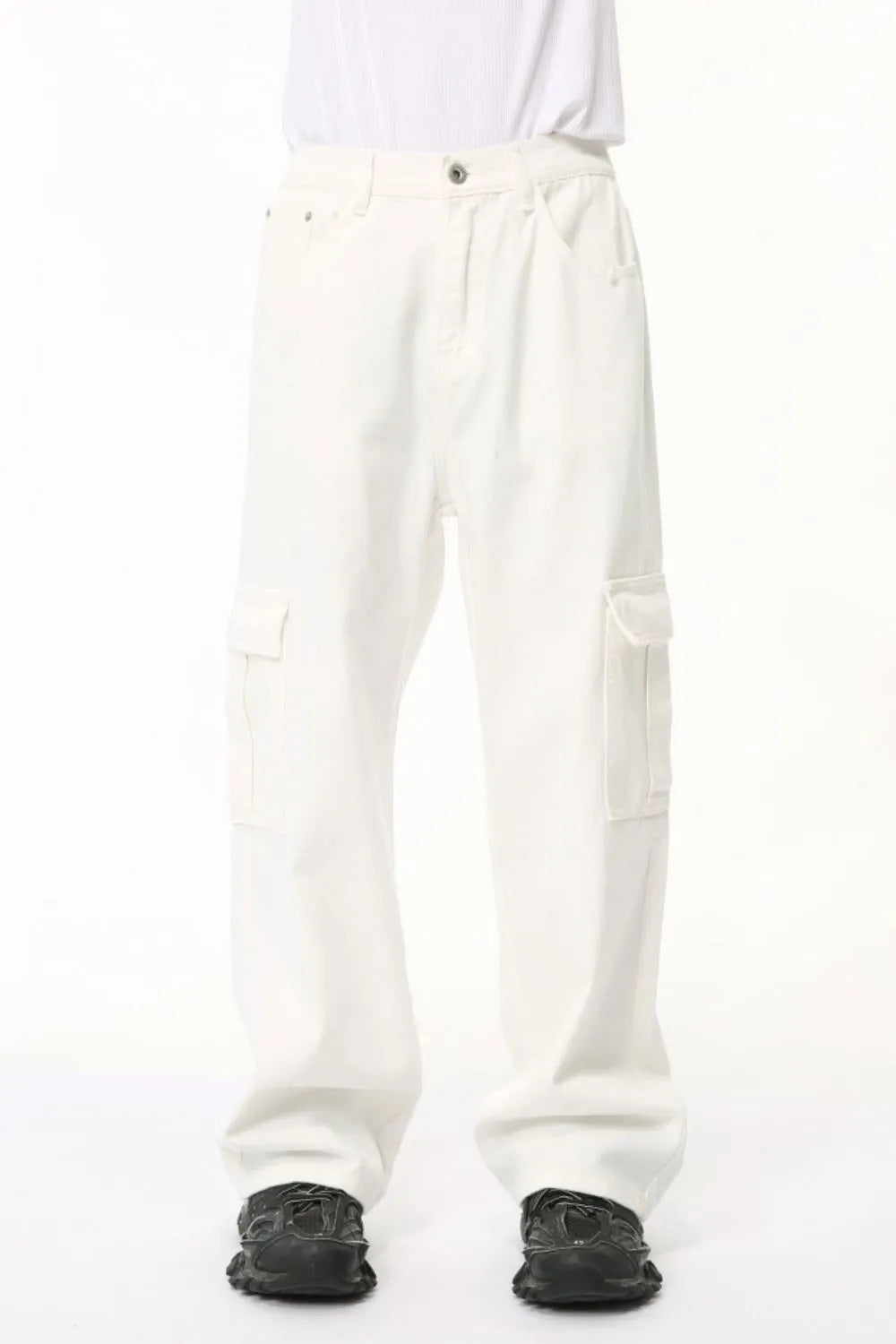 Ivory cargo pants with multiple pockets and a relaxed fit.