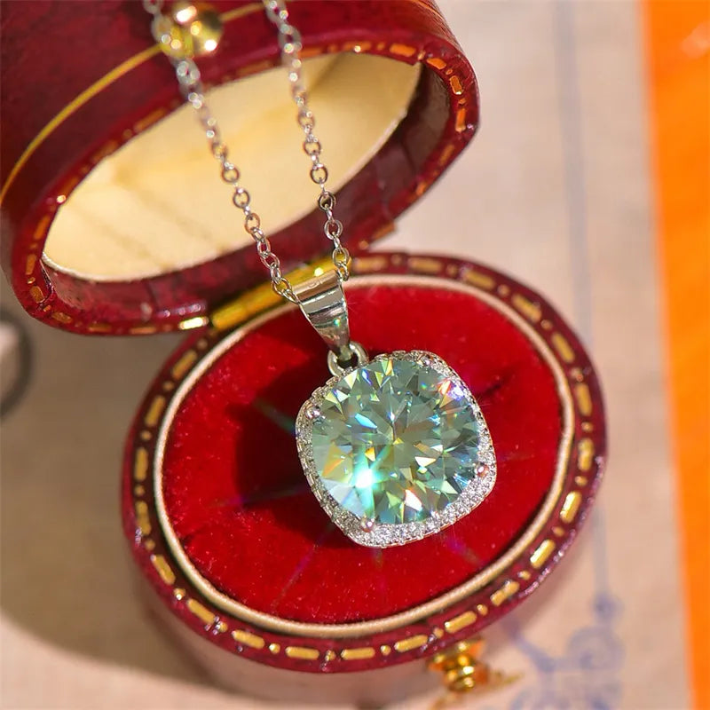 Silver cushion-cut moissanite halo pendant necklace with dazzling sparkle.