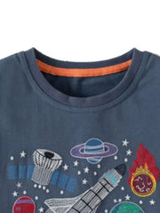 Toddler T-shirt with space embroidery and orange neck trim.