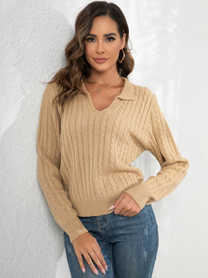 Khaki cable knit polo neck jumper with long sleeves.