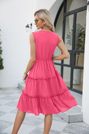 Hot Pink sleeveless midi dress with tiered ruffled skirt and lace trim detail.