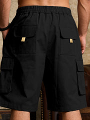 Black cargo shorts with drawstring waist and multiple flap pockets.