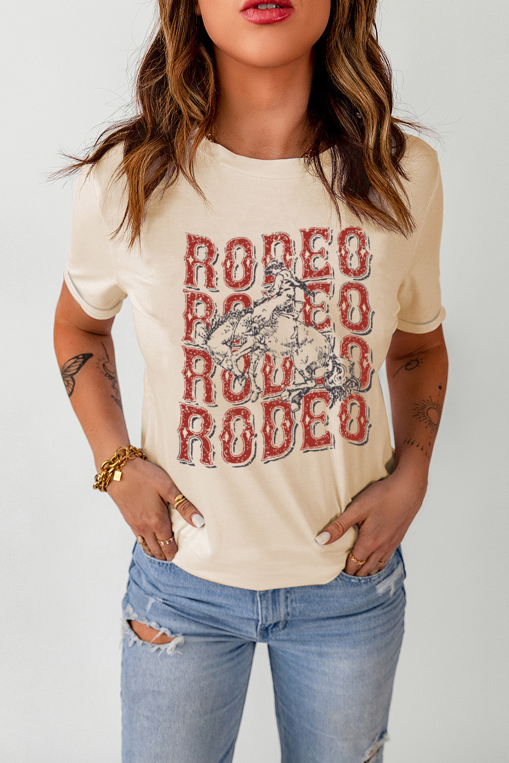 Light Apricot crewneck tee with a vintage rodeo graphic and distressed details.