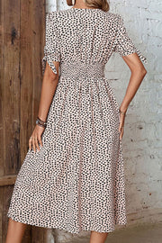 Tan spotted print smocked waist midi dress with tie sleeve detail