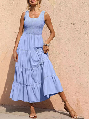 Light Blue smocked bodice ruffled maxi dress with tiered skirt.
