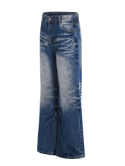 Men's light blue vintage wash wide leg jeans with distressed details