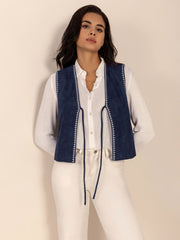 Dark blue suede-effect vest with white stitch trim and tie front.