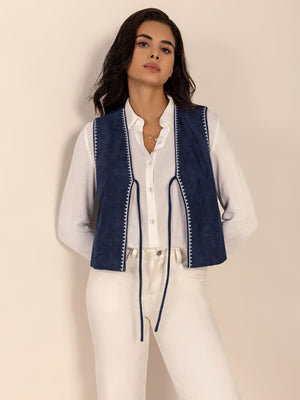 Dark blue suede-effect vest with white stitch trim and tie front.
