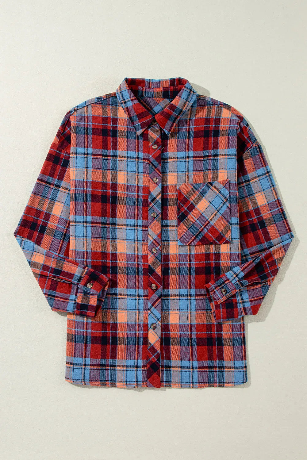 Oversized plaid shacket with button-down collar in orange and deep red tones.