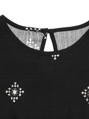 Black sleeveless top with geometric print and keyhole back detail.