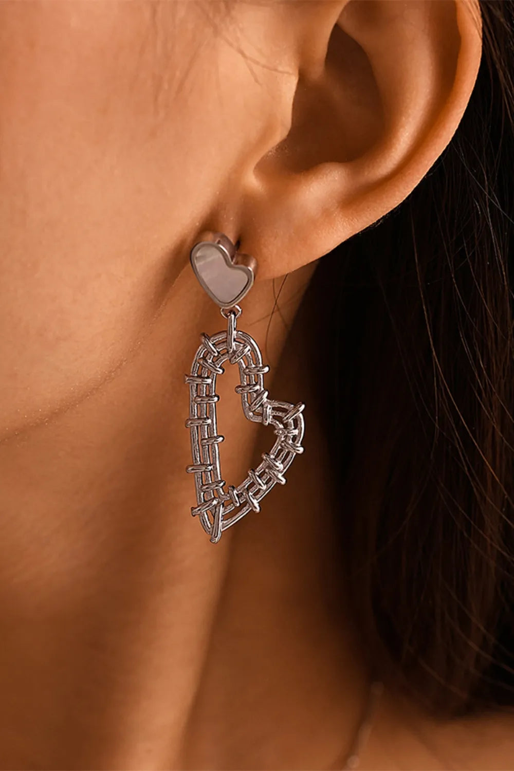 Silver woven heart dangle earrings with a small heart stud