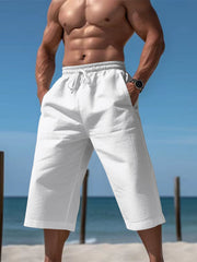 Relaxed fit white drawstring cropped sweatpants with pockets