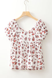 Floral gathered bust puff sleeve blouse with a square neckline.