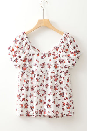 Floral gathered bust puff sleeve blouse with a square neckline.