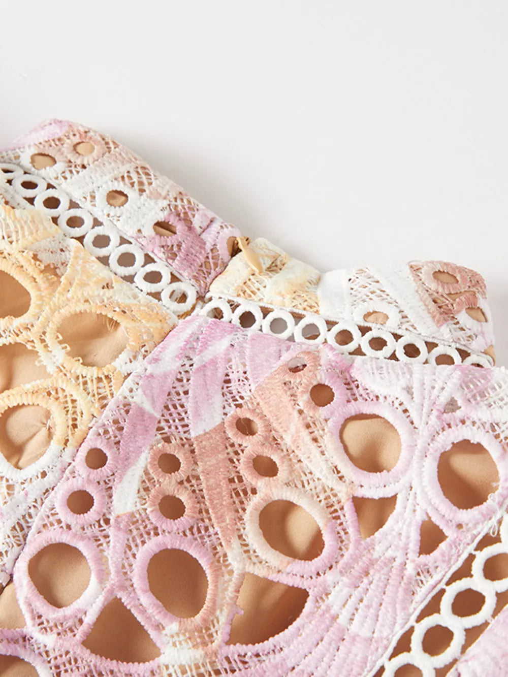 Pink purple floral lace maxi gown with cutout details and scalloped trim.