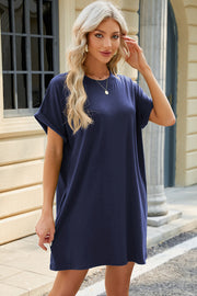 Dark blue casual dress with cuffed short sleeves and a round neckline.